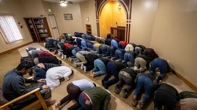 Worshippers take part in Friday prayers at the mosque. AP photo