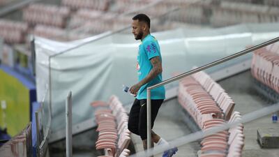 Brazil's Neymar makes his way from the stands. Reuters