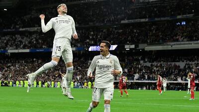 Federico Valverde celebrates with Lucas Vazquez after scoring Real Madrid's third goal. AFP