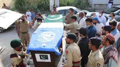 Pakistani soldiers attend the funeral of Maj Faizan Ali, who died in helicopter crash in Democratic Republic of Congo, in 2022. EPA