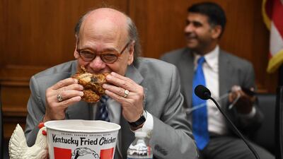 US Congressman Steve Cohen, Democrat of Tennessee, eats KFC chicken during a hearing before the House Judiciary Committee on Capitol Hill in Washington, DC. AFP