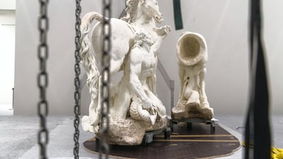 Horses of the Sun by Gilles Guérin (c.1670) waits to be installed inside Louvre Abu Dhabi. Christopher Pike / The National