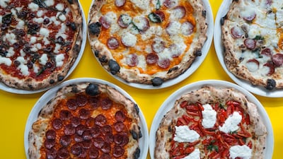 Akiba Dori's pizzas are cooked in a wood-fired oven and made with Japanese dough.