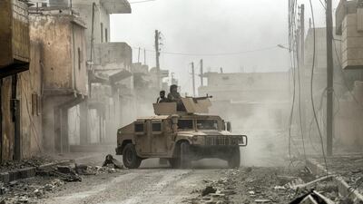 Syrian Democratic Forces hold a position on the eastern frontline of Raqqa on September 24, 2017. AFP