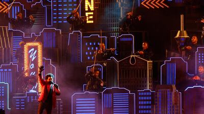 The Weeknd performed in front of a Las Vegas-style set-up. Reuters