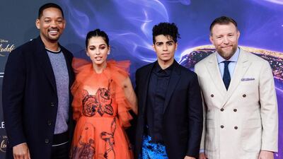 Smith, Scott, Massoud and director Guy Ritchie cosy up at the Berlin premiere. EPA.