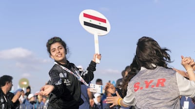 Special Olympics Syrian team dancing at the host town closing ceremony in Global Village. Reem Mohammed / The National