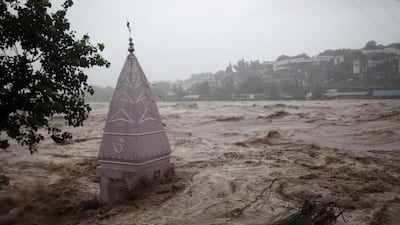A temple is partially submerged in floodwaters in Jammu, India on September 6, 2014. Channi Anand/AP Photo