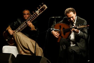 Naseer Shamma performs with sitar maestro Ashraf Sharif Kahn in Sharjah in 2014. Antonie Robertson/The National