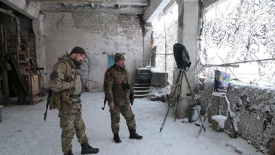 Ukrainian soldiers at an observation post on the roof of an abandoned factory overlooking separatist territory in Novoluhanske, eastern Ukraine. Florian Neuhof for The National