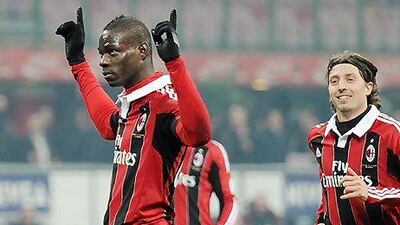 Mario Balotelli, who has scored four times in three matches for AC Milan, is cup-tied for the Champions League game. Daniel dal Zennaro / EPA