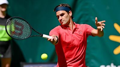 Roger Federer plays a forehand to Ilya Ivashka during their Halle Open first round match. Getty Images