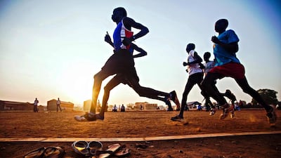 South Sudanese runners, selected by the South Sudanese Athletic Federation, train in the open field of the Buluk Athletics Track in Juba ahead of trials for the Rio Olympics. Gonzalez Farran / AFP Photo