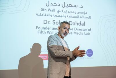 Sohail Dahdal speaks about the AR experience of the Resistance Monument's museums during its opening. Issa AlKindy for The National