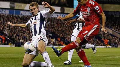 Luis Suarez, right, was involved in both Liverpool goals in their 2-0 win at West Brom yesterday.