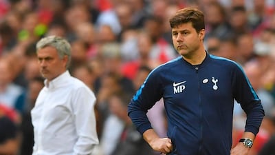 Manchester United's Portuguese manager Jose Mourinho (L) and Tottenham Hotspur's head coach Mauricio Pochettino look on during the FA Cup semi-final at Wembley in 2018. Mourinho replaced Pochettino as Spurs manager after the Argentine was sacked. AFP