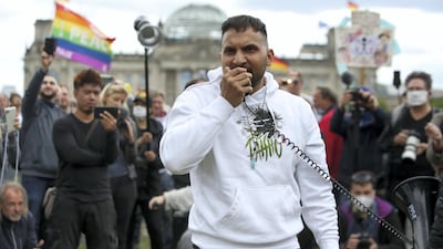 Attila Hildmann speaks at a rally in front of the German parliament in Berlin. Getty Images