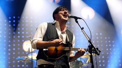 Lead singer Marcus Mumford performs with Mumford & Sons at the Barclays Center in New York. Jason DeCrow / Invision / AP Photo