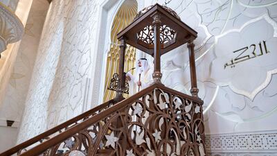 An imam delivers a sermon during Eid Al Fitr prayers at the Sheikh Zayed Grand Mosque. Mohamed Al Hammadi / Ministry of Presidential Affairs