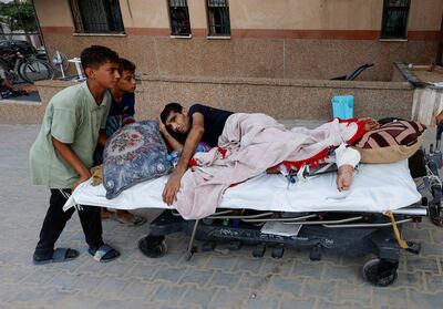 A wounded Palestinian is evacuated from Gaza's European Hospital earlier this month. Reuters