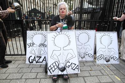 A pro Palestinian protester on Downing Street in London. AFP