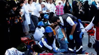 Students and staff at Dubai Womens College take part in a mass casualty incident simulation at the campus in Dubai .