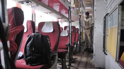 Indian police at the scene of an accident in which 18 were killed and 25 injured when a speeding truck rammed into an overcrowded double-decker bus in Barabanki. Getty Images