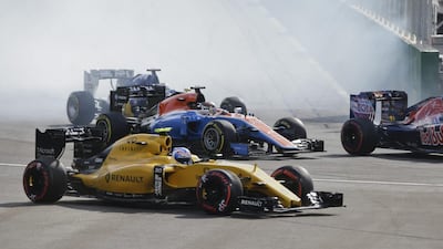 Renault driver Jolyon Palmer drives off the track after the start. Luca Bruno / AP Photo