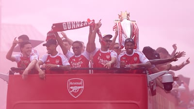 Arsenal players during the open-top buses parade. PA