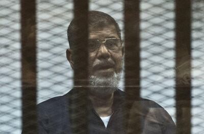 Mohammed Morsi on trial in Cairo in 2015. AFP