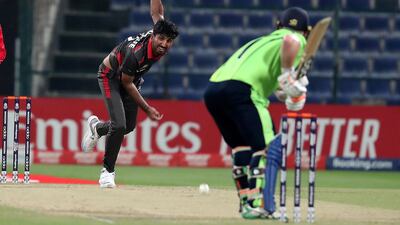 Junaid Siddique of UAE bowls during the World Cup T20 Qualifier against Ireland. Pawan Singh / The National