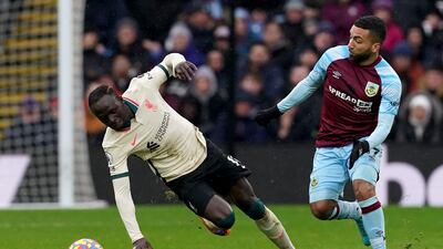 Liverpool's Sadio Mane battles with Burnley's Aaron Lennon. PA
