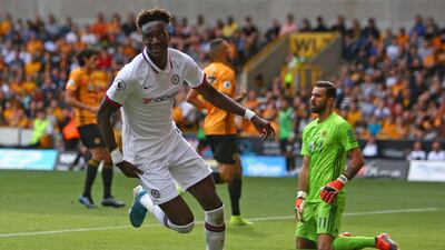 Chelsea's English striker Tammy Abraham celebrates after scoring their fourth goal and his third in a 5-2 win for Chelsea against Wolves at Molineux. AFP