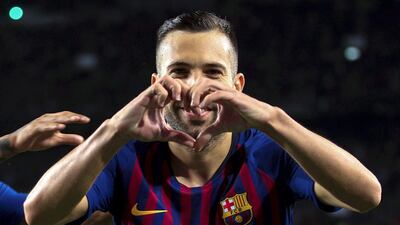 Jordi Alba celebrates with midfielder Arturo Vidal. EPA