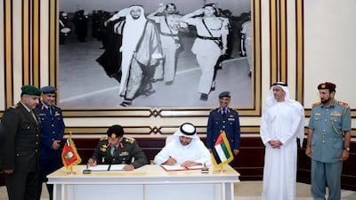 Sheikh Saif bin Zayed, second from right, Deputy Prime Minister and Minister of Interior, attends the signing of an memorandum of understanding to raise awareness among students to the national service project. Wam