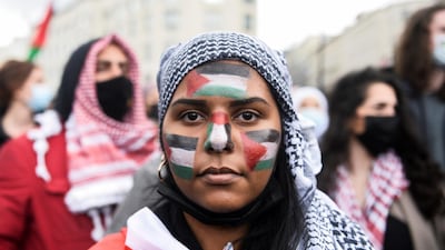 A pro-Palestine supporter takes part in a protest in Brussels, Belgium. Reuters