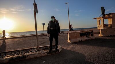 Palestinian policemen patrol the beachfront in Gaza City. EPA