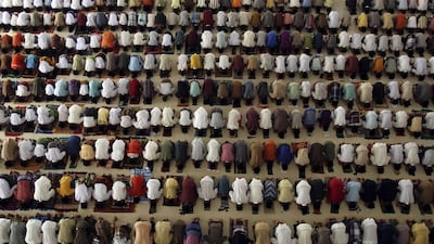 Students at an Islamic boarding school perform prayers at a mosque on the first day of the holy fasting month of Ramadan in Medan, North Sumatra June 29, 2014. YT Haryono/Reuters