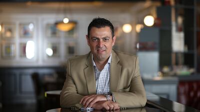 Naim Maadad , chief executive of Gates Hospitality, has warned his staff they must be alert to meet customer demands. Pawan Singh / The National
