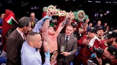 Saul 'Canelo' Alvarez celebrates after his win over Rocky Fielding in their WBA super middleweight title fight. AP Photo
