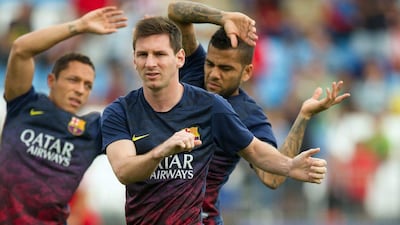 Lionel Messi suffered a thigh injury during Barcelona's Primera Liga win over Almeria. Denis Doyle / Getty Images