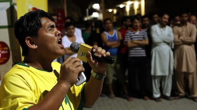 Suraj Subba from Nepal sings during the first auditions at a labour camp in Dubai for last year’s Camp Ka Champ contest. Satish Kumar / The National