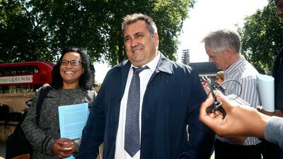 Former Pimlico Plumbers employee Gary Smith won a court ruling giving him employment rights, in a case seen as a key test of labour rules in the so-called gig economy. Yui Mok/PA via AP