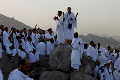 Pilgrims gather at the Mount of Mercy on the Arafat plain. Reuters