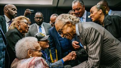 Survivors Hughes Van Ellis and Viola Fletcher are greeted by Reverend Al Sharpton, and Reverend Jesse Jackson at a rally during commemorations of the 100th anniversary of the Tulsa Race Massacre on June 1, in Tulsa, Oklahoma. AFP