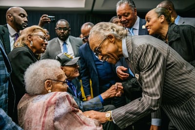 Survivors Hughes Van Ellis and Viola Fletcher are greeted by Reverend Al Sharpton, and Reverend Jesse Jackson at a rally during commemorations of the 100th anniversary of the Tulsa Race Massacre on June 1, in Tulsa, Oklahoma. AFP