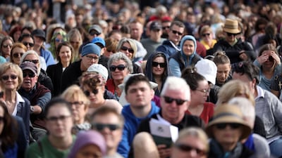 People attend the national remembrance service for the 50 victims of the Christchurch mosque shootings, held at Hagley Park on March 29, 2019. AFP