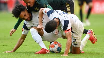 Bochum's Ugandan defender Herbert Bockhorn, Bayern Munich's midfielder Leroy Sane and Bochum's French midfielder Anthony Losilla vie for the ball. AFP