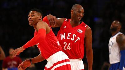 Russell Westbrook and Kobe Bryant celebrate after a play in the second half of Sunday’s NBA All-Star Game in Toronoto. (Getty Images)