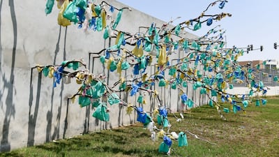 A plastic tree by Cameroonian artist Pascale Marthine Tayou at the Special Olympics Gardens. Khushnum Bhandari / The National